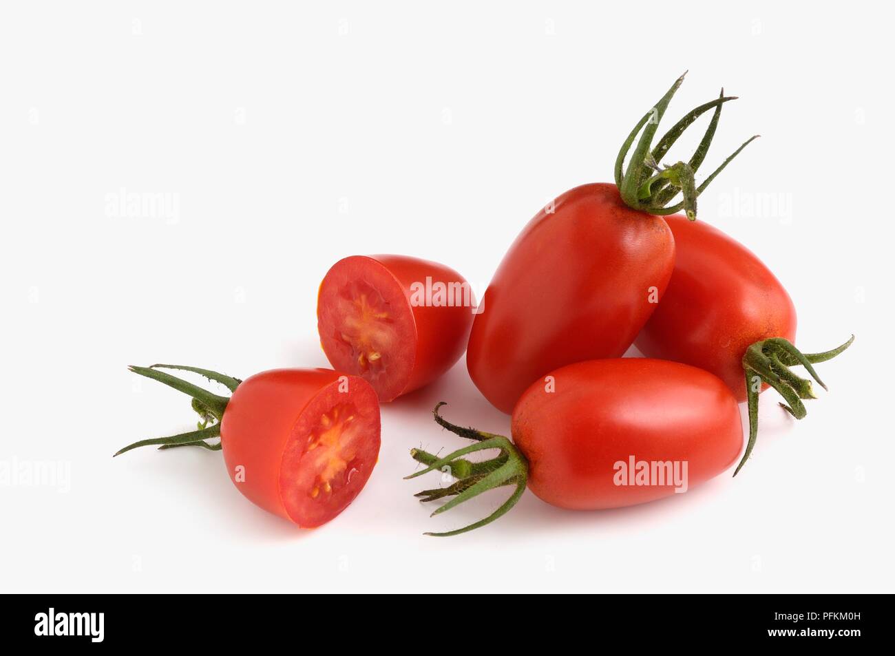 Whole and sliced red Taiwanese Juliet tomatoes Stock Photo Alamy