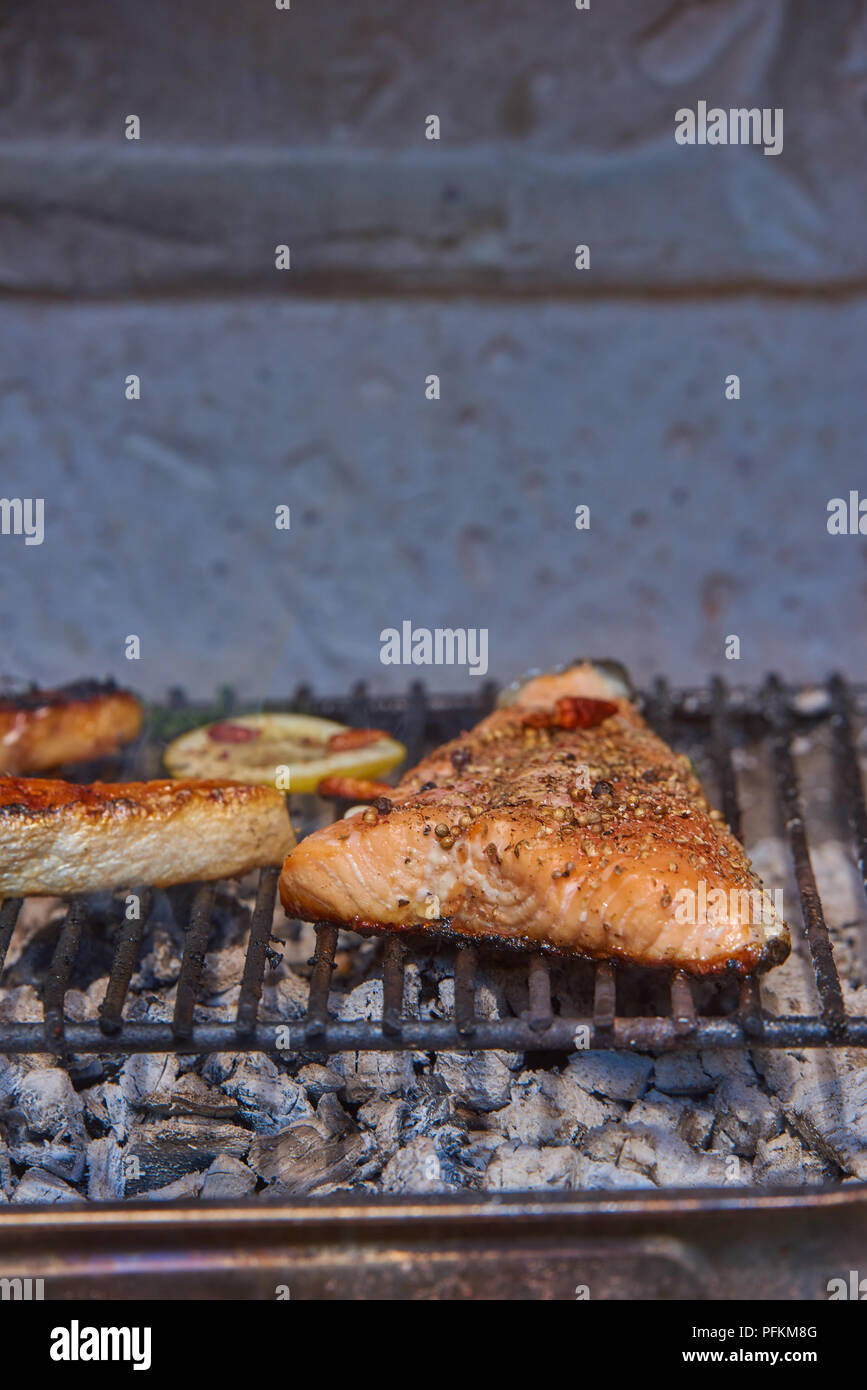 salmon on grill with dill lemon Stock Photo Alamy