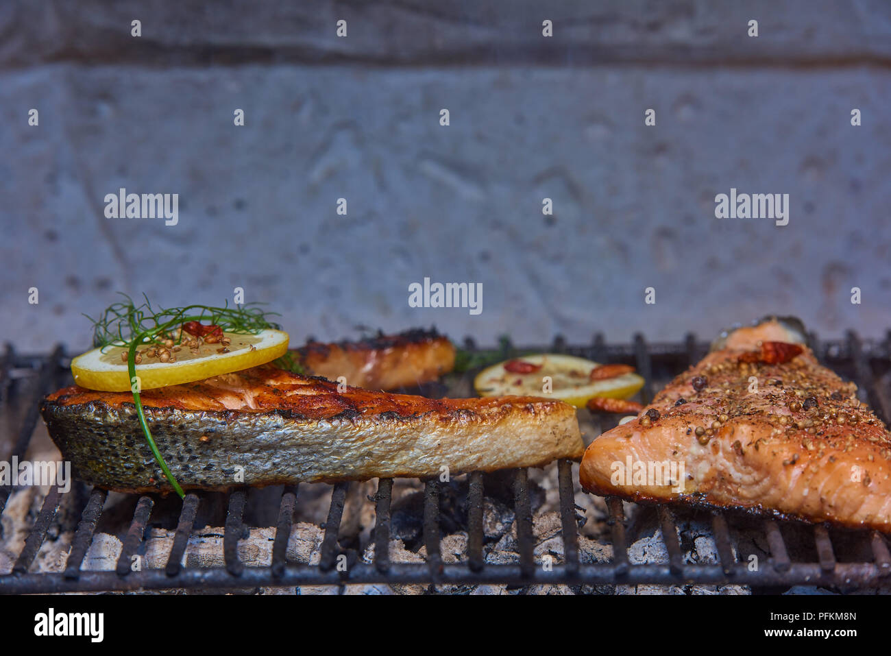 salmon on grill with dill lemon Stock Photo Alamy