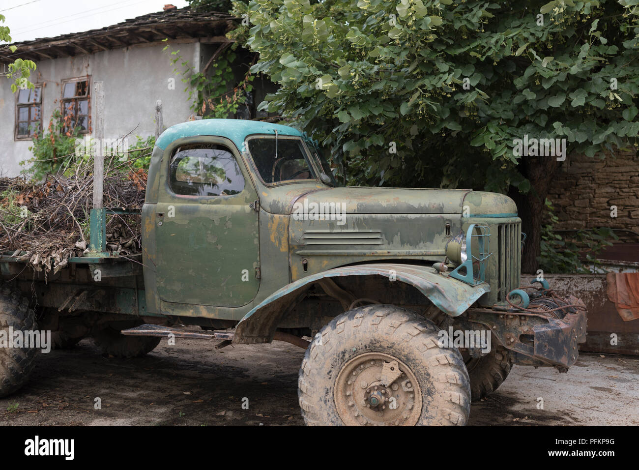 Russian army truck in Bulgaria now used for agricultural transportation Stock Photo