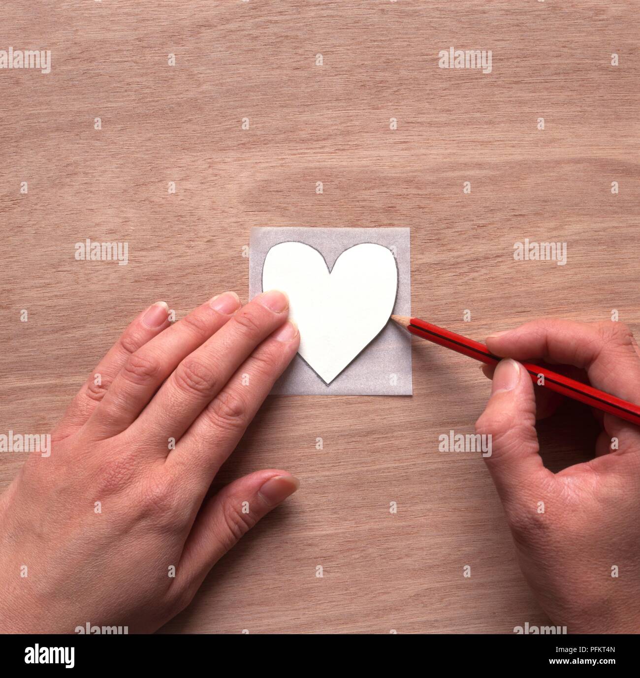 Making heart shape applique, drawing outline of heart shape onto