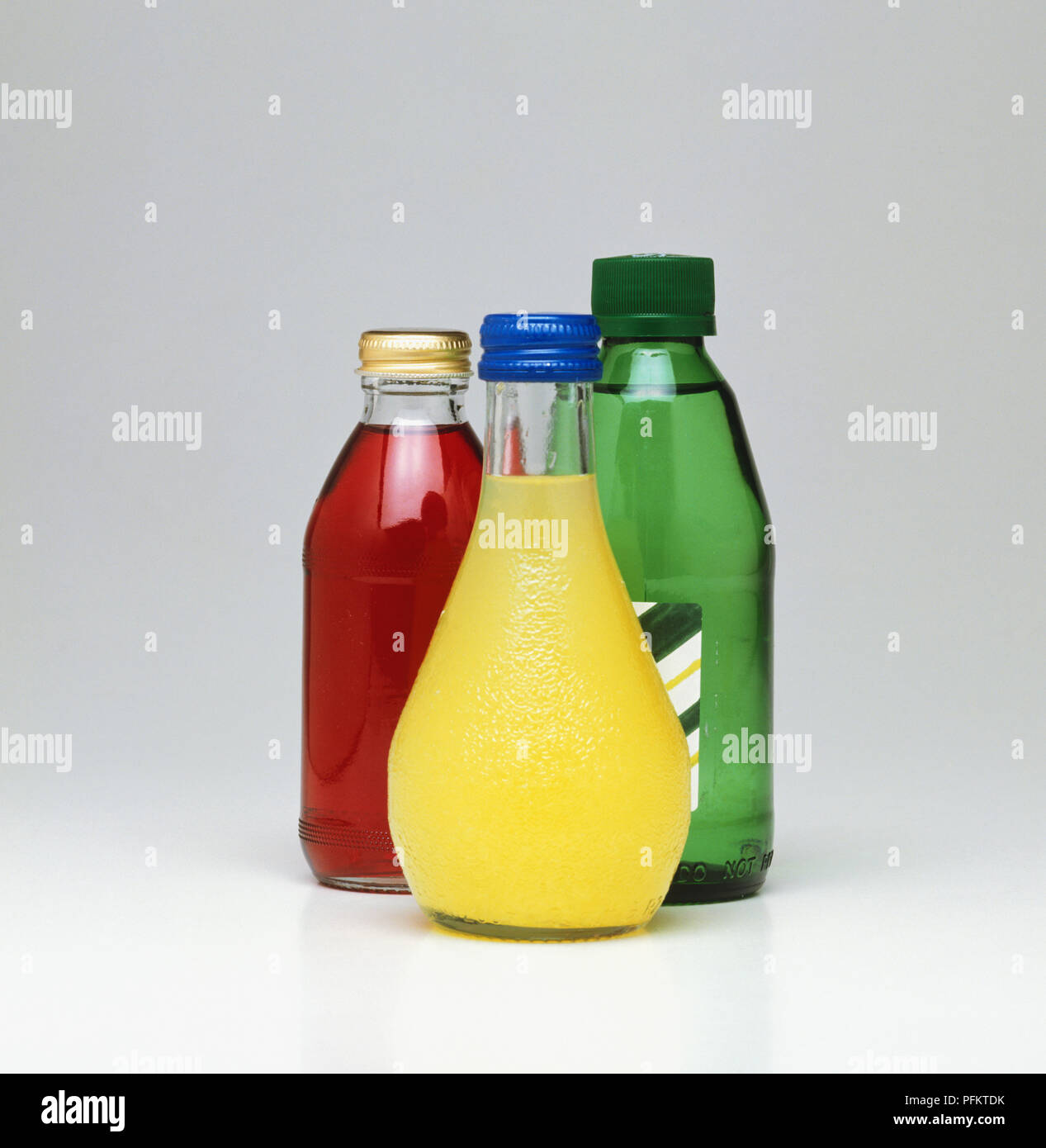 Three soft drink bottles Stock Photo Alamy