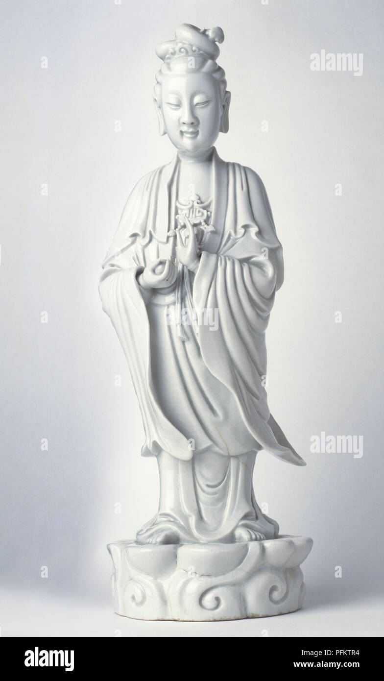 Statue of Buddhist goddess Kuan Yin Stock Photo