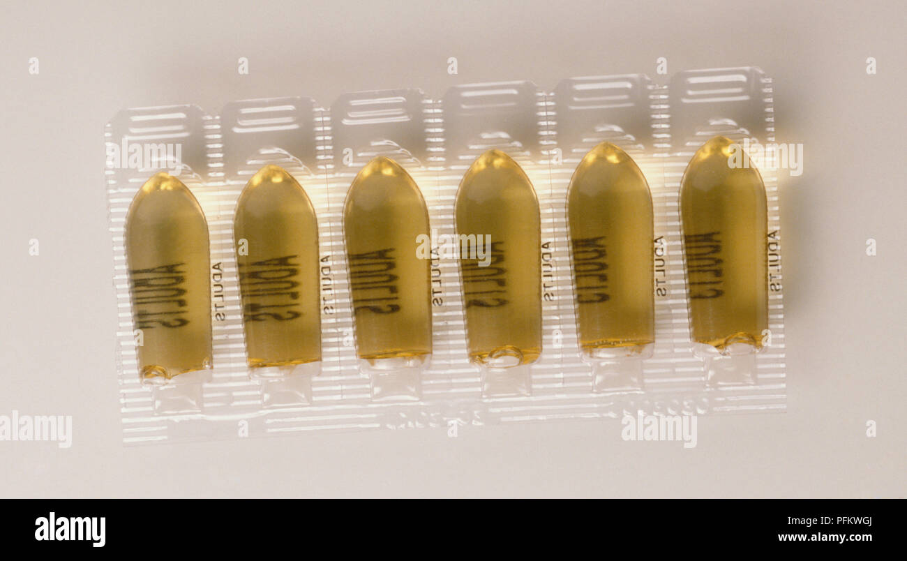 Download Six Yellow Suppository Capsules In Clear Plastic Tray Close Up Stock Photo Alamy PSD Mockup Templates