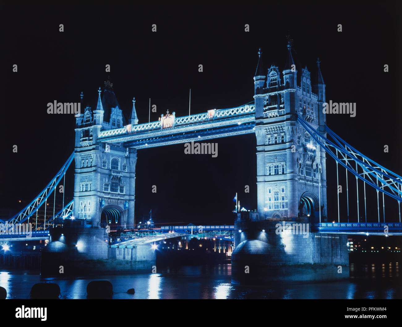 Tower bridge taken at night with blue filters Stock Photo - Alamy