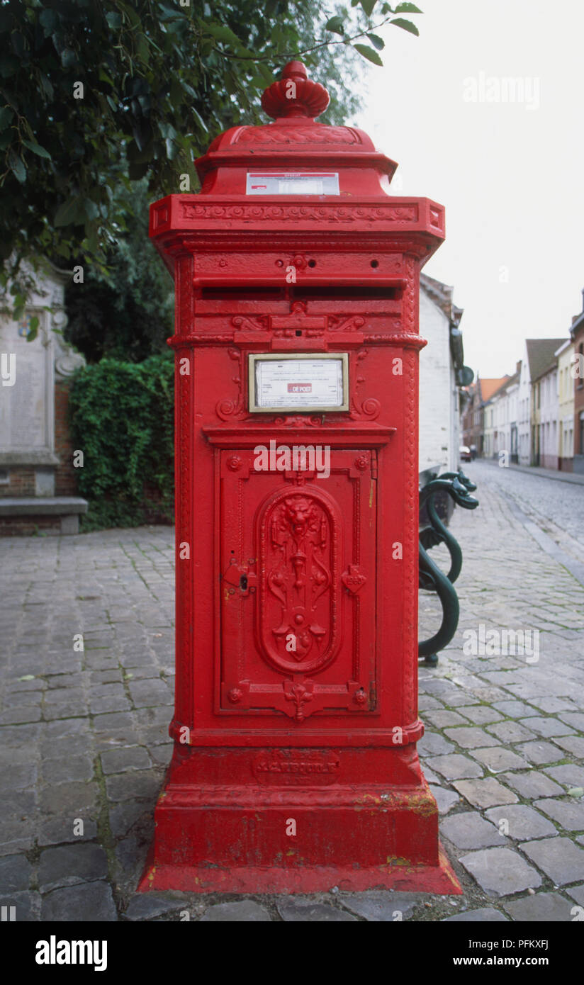 Belgium, traditional red postbox in cobbled street Stock Photo - Alamy
