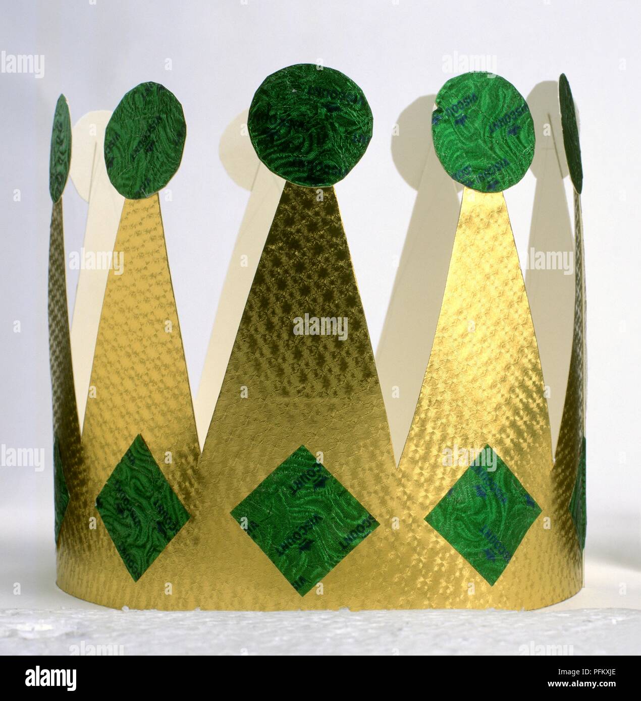 Gold and green paper crown, close-up Stock Photo