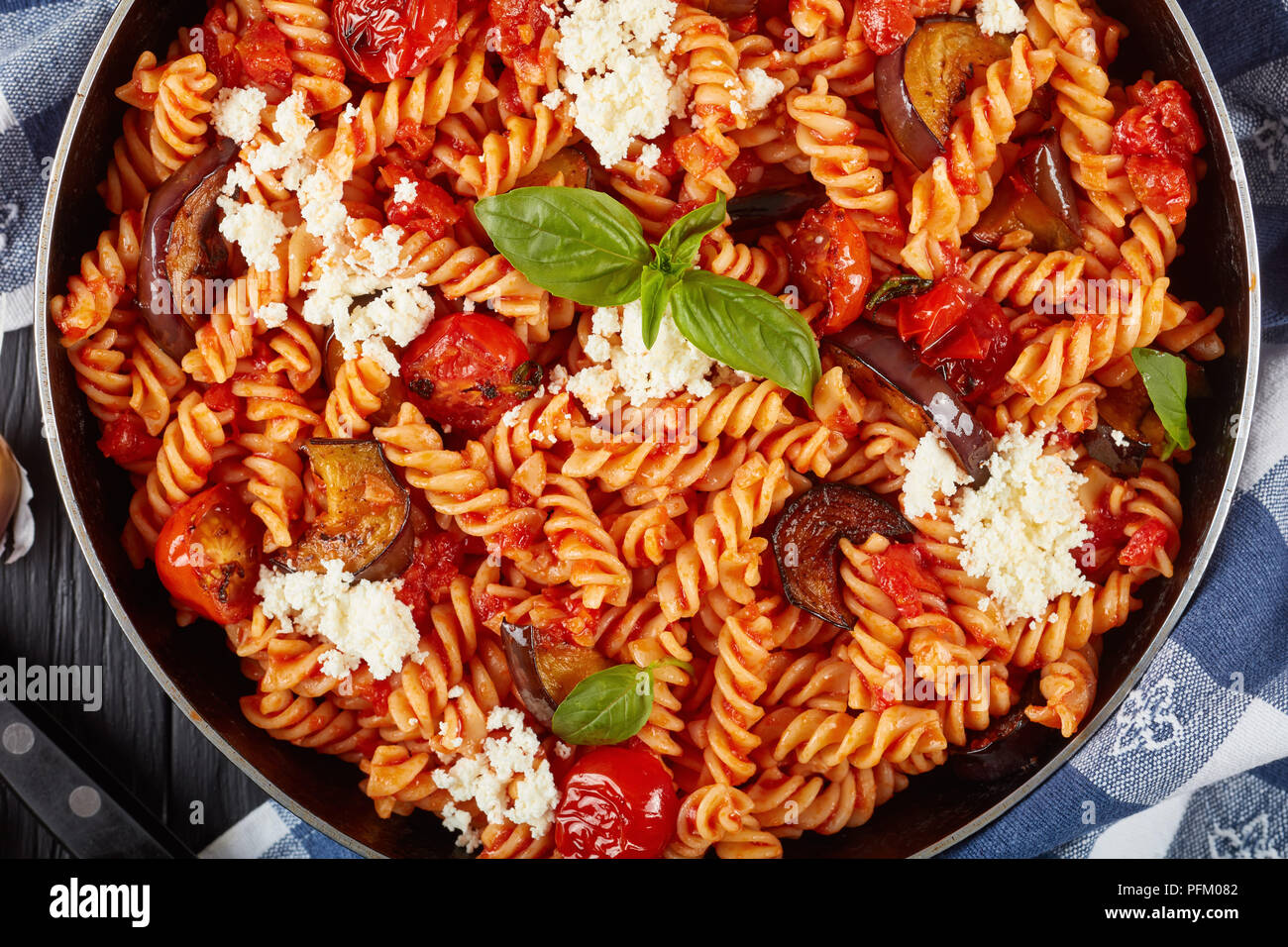 Vegetarian Italian Pasta fusilli alla Norma with eggplant, tomatoes