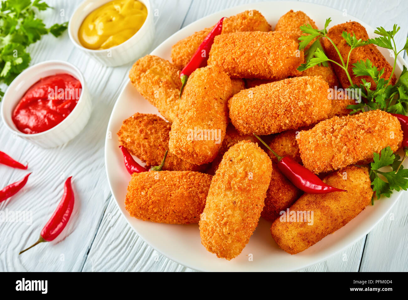 closeup of spanish deepfried golden brown potato croquettes