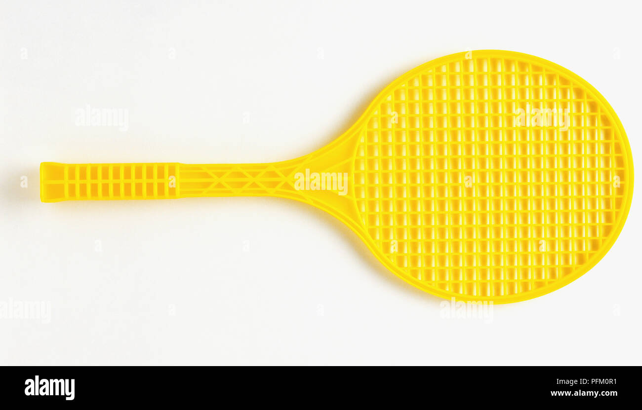 Plastic yellow tennis racket Stock Photo Alamy