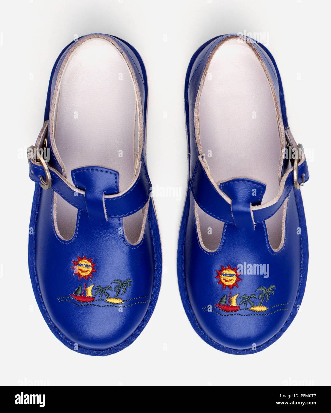 Pair of blue children's shoes Stock Photo Alamy