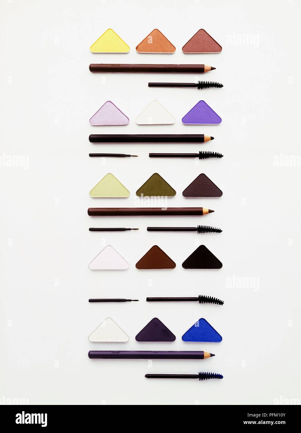 Array of different coloured eye shadows, eye liners and mascara Stock Photo