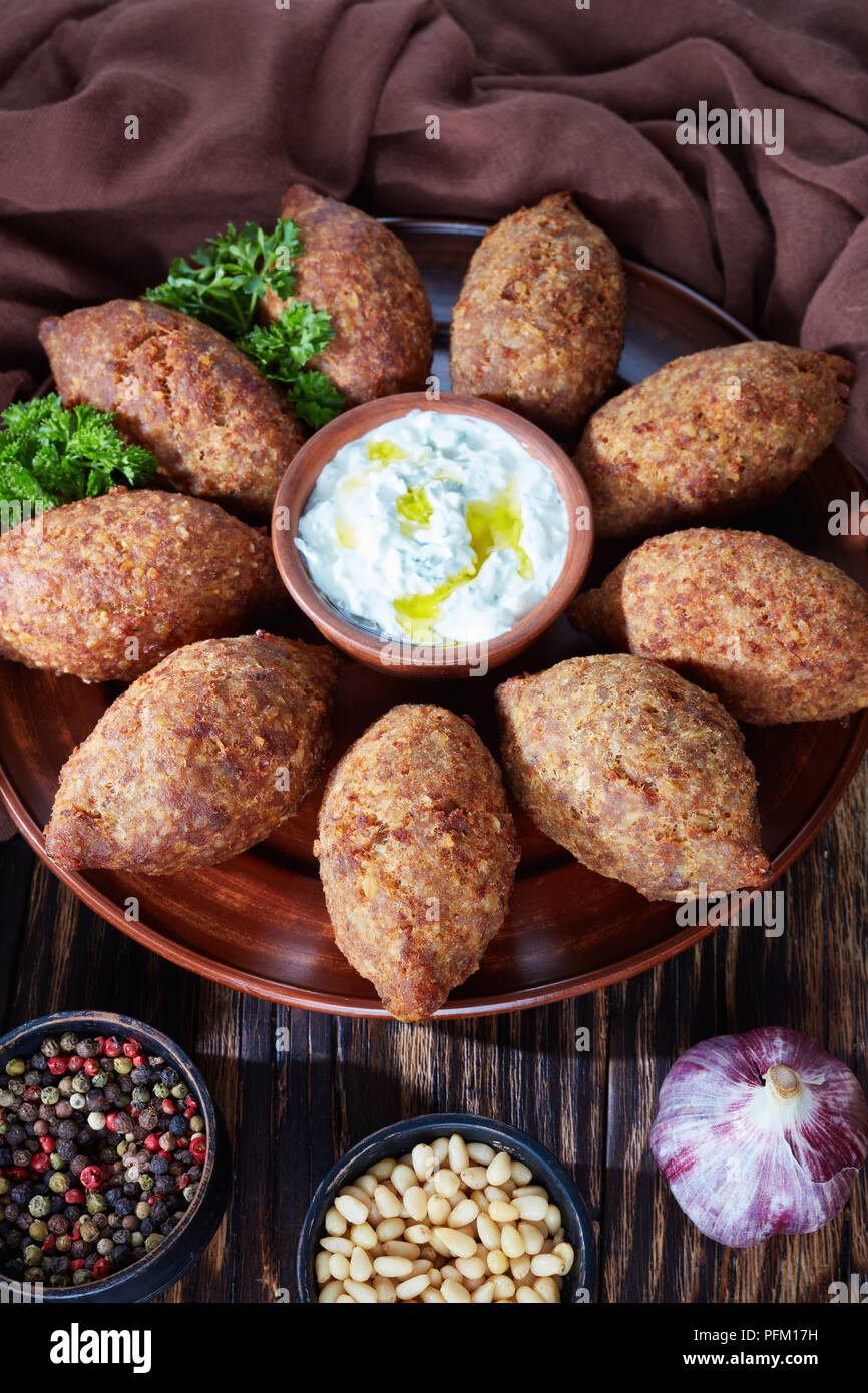 deep fried kibbeh of ground beef meat mixed with bulgur, stuffed with