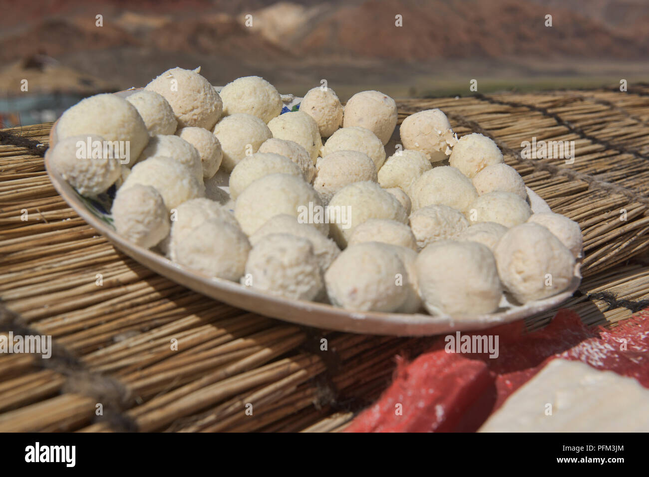 Kaymak cheese balls made by Kyrgyz nomads, Pshart Valley, Tajikistan