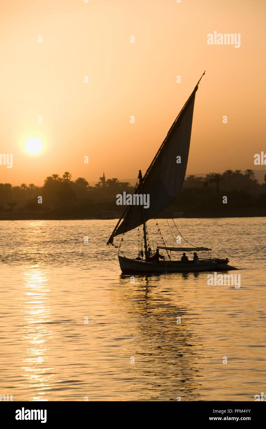 Egypt, Luxor, felucca boat on the River Nile at sunset Stock Photo
