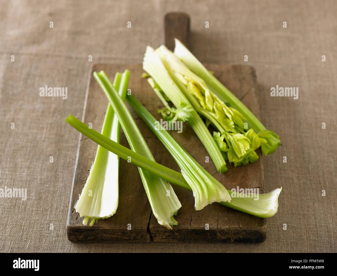 Celery on chopping board Stock Photo