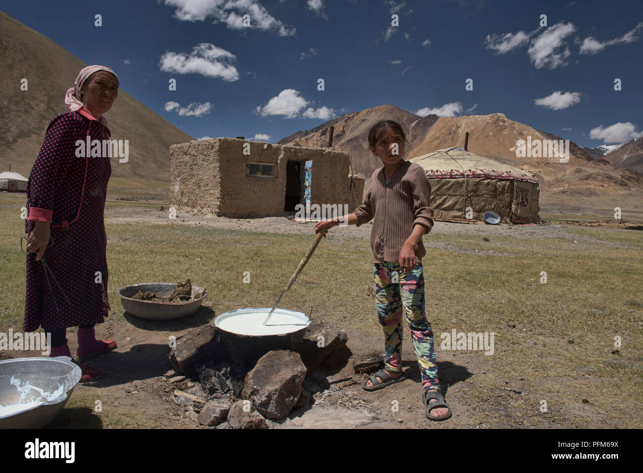 Kyrgyz nomads making dairy products, Pshart Valley, Tajikistan Stock Photo