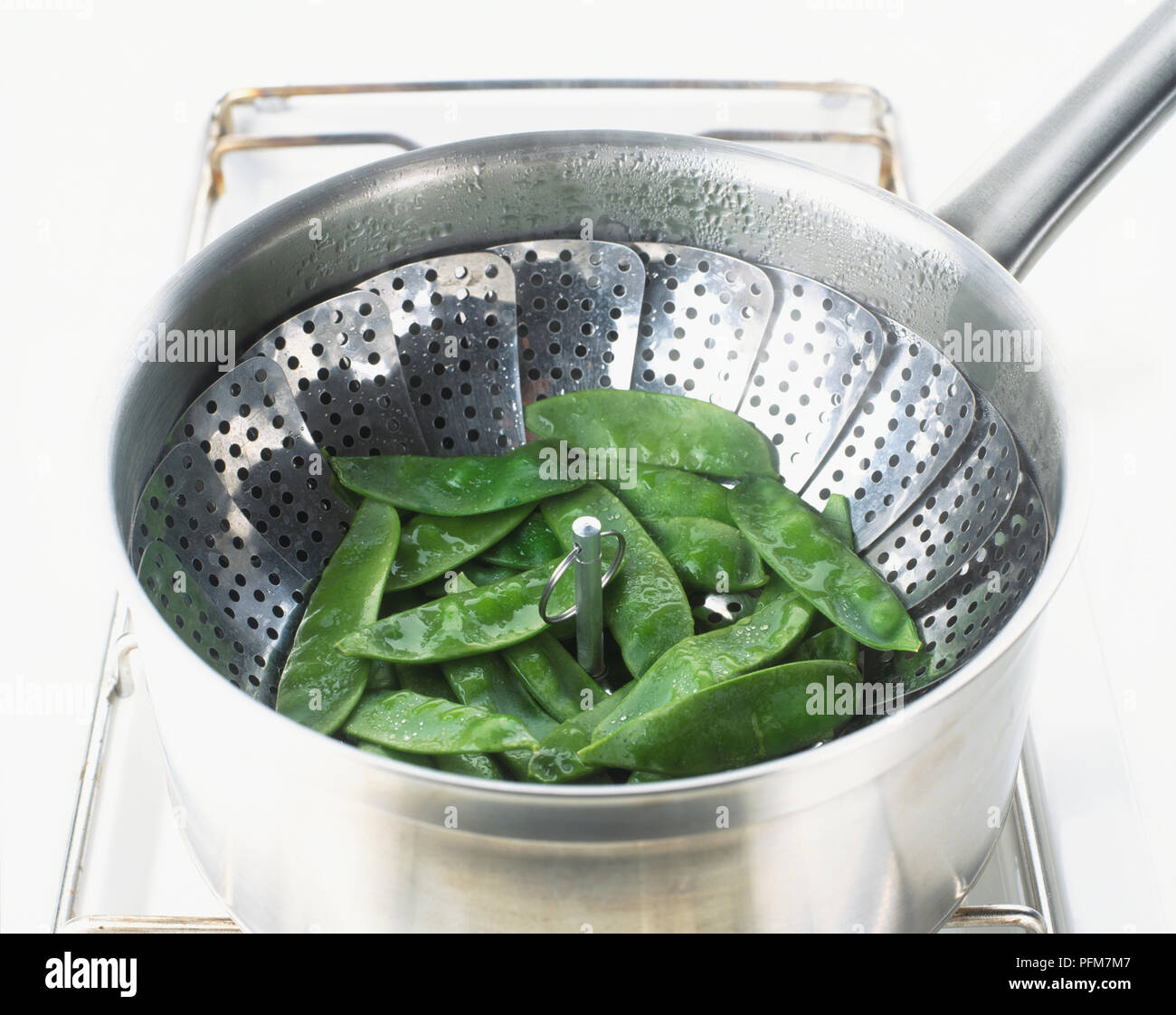 Steaming Using Colander Diet and eating hi-res stock photography and images - Alamy