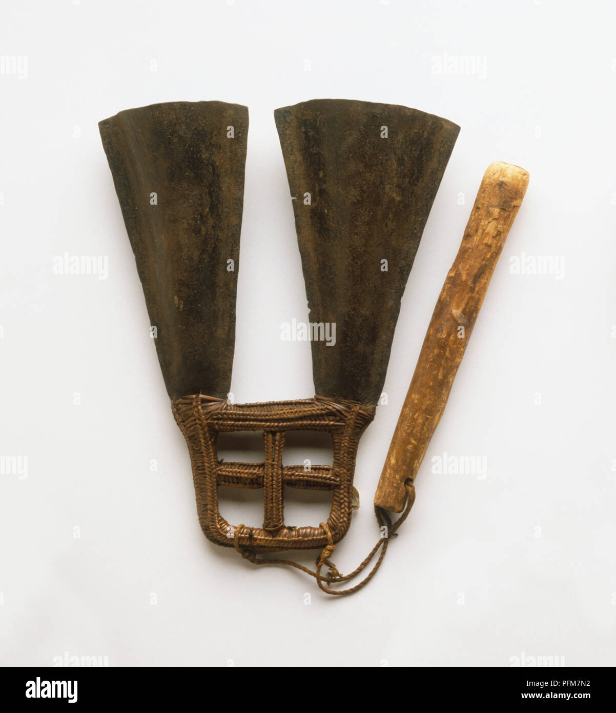 Gong and wooden beater from Benin Stock Photo