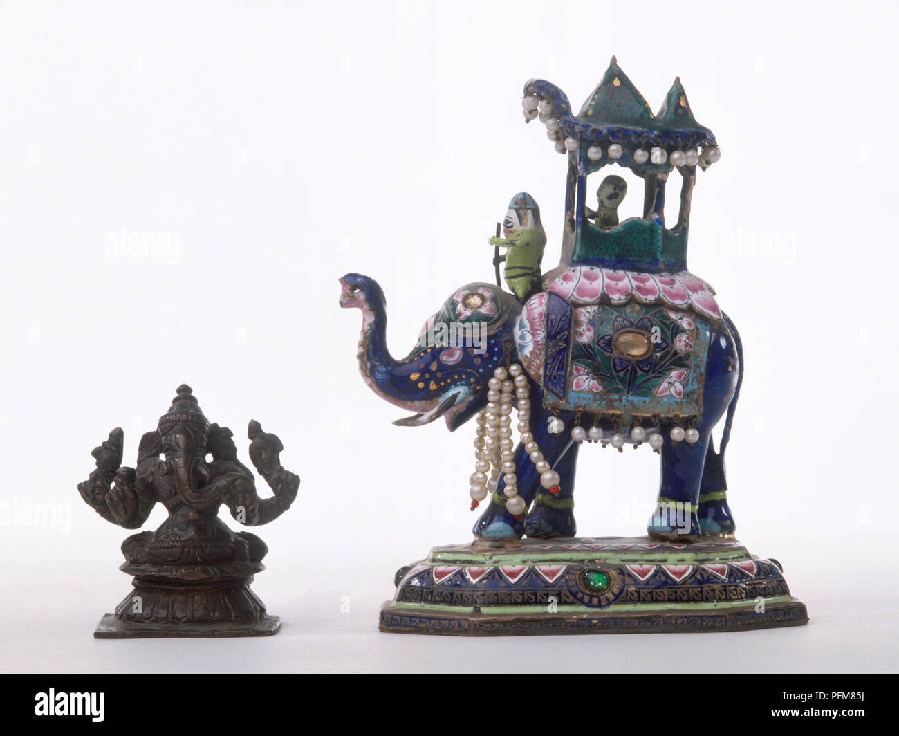 Elephant god and decorated elephant figurine Stock Photo