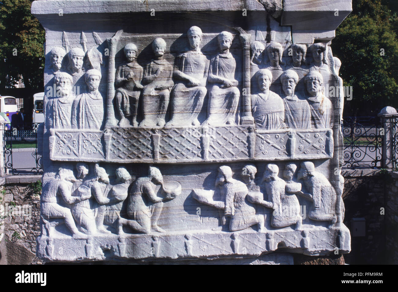 Asia, Turkey, Istanbul, Hippodrome, relief carved on the base of the Egyptian Obelisk, depicting figures in traditional dress, built in 1500 BC. Stock Photo