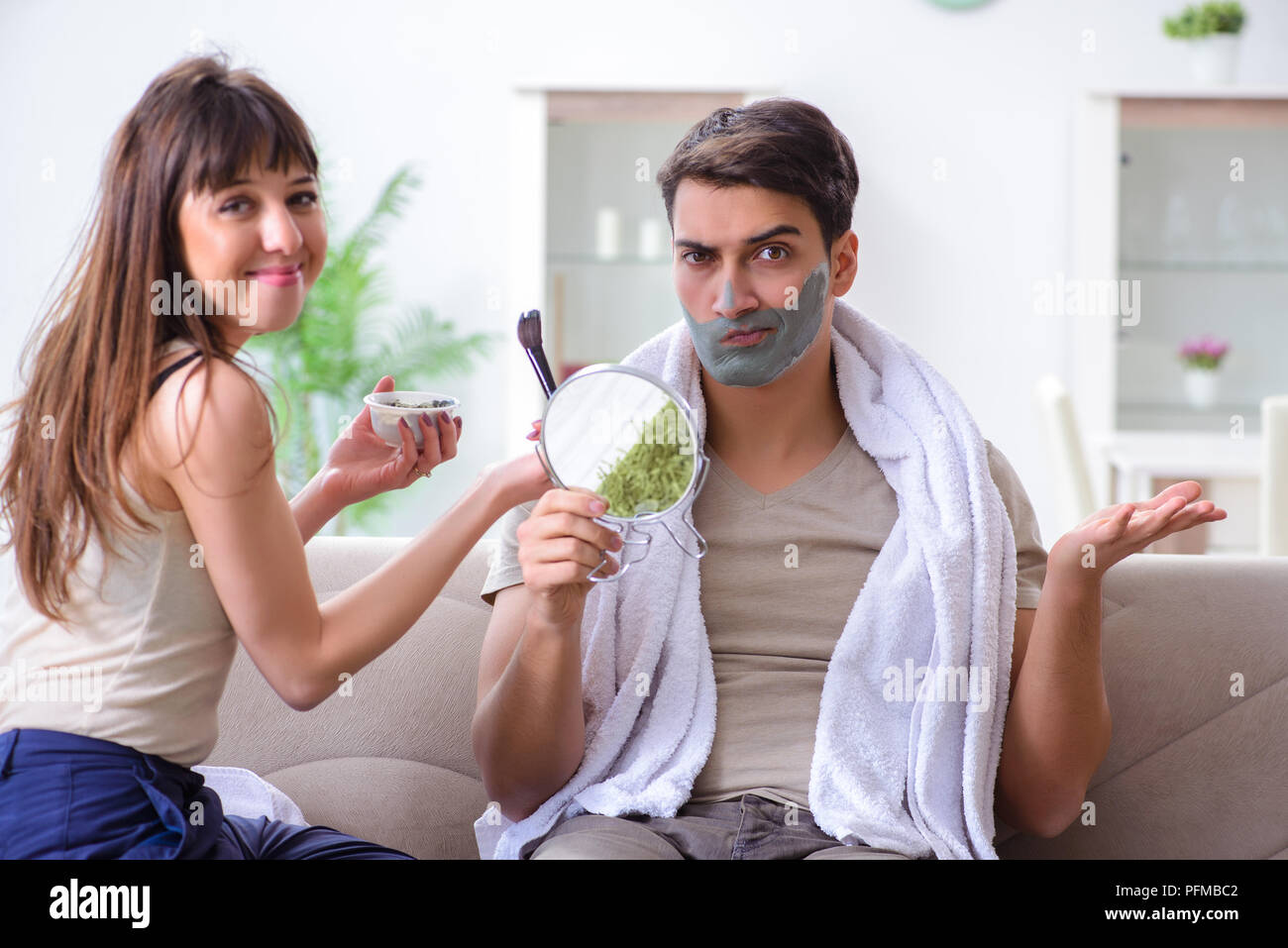 Man peeling off mask hi-res stock photography and images - Alamy
