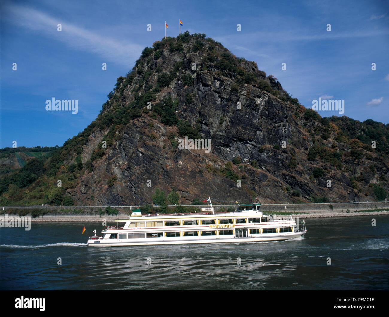 Germany, Rhineland-Palatine, passenger boat passing by the Loreley rock Stock Photo