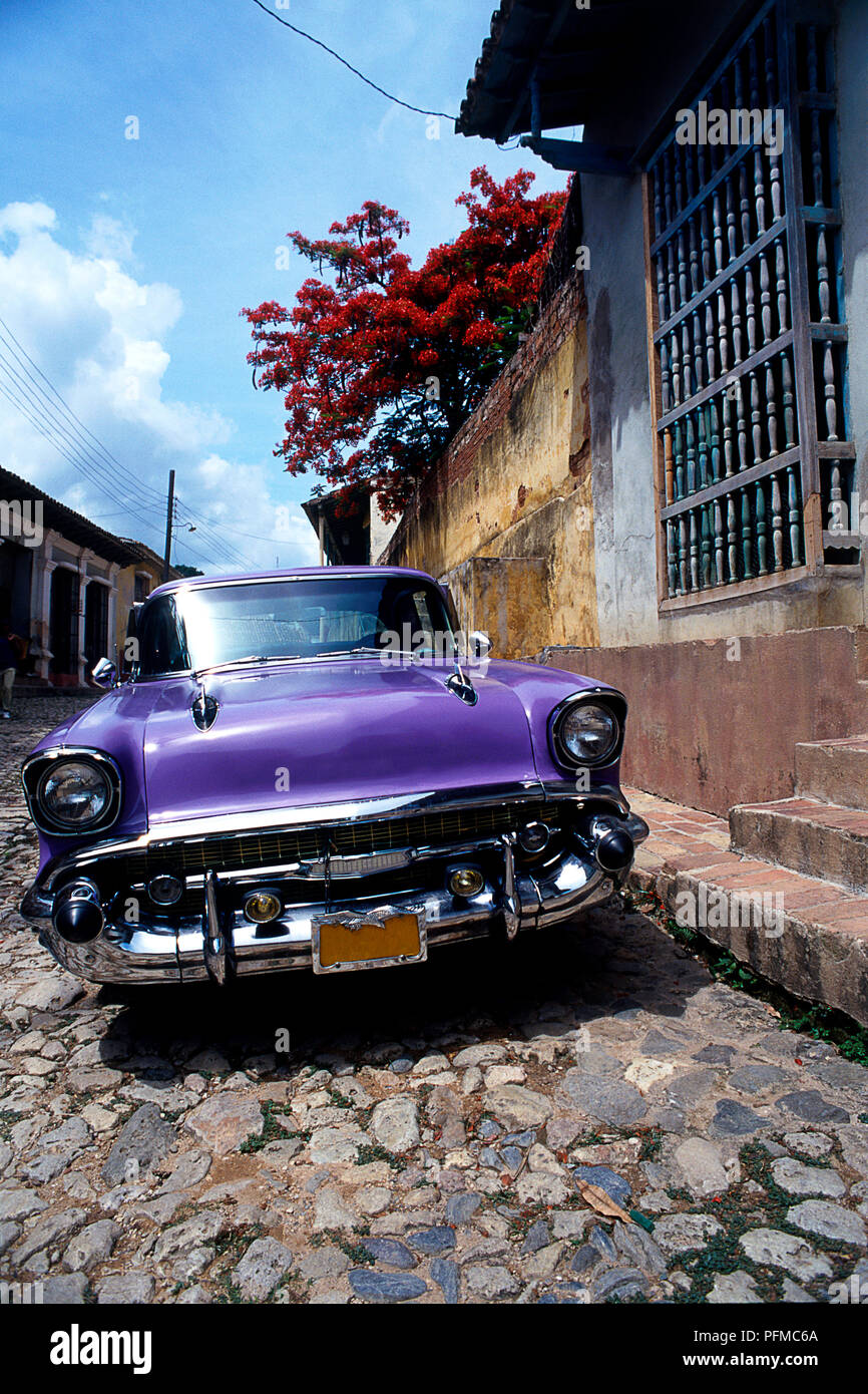 Cuba, Trinidad, purple Chevrolet parked in back street Stock Photo