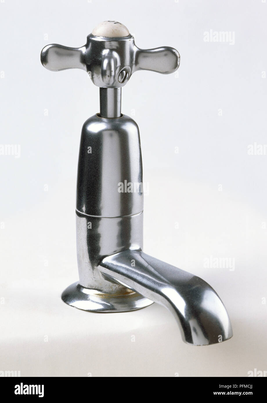 Chrome tap, simple classic design, angled front view. Stock Photo