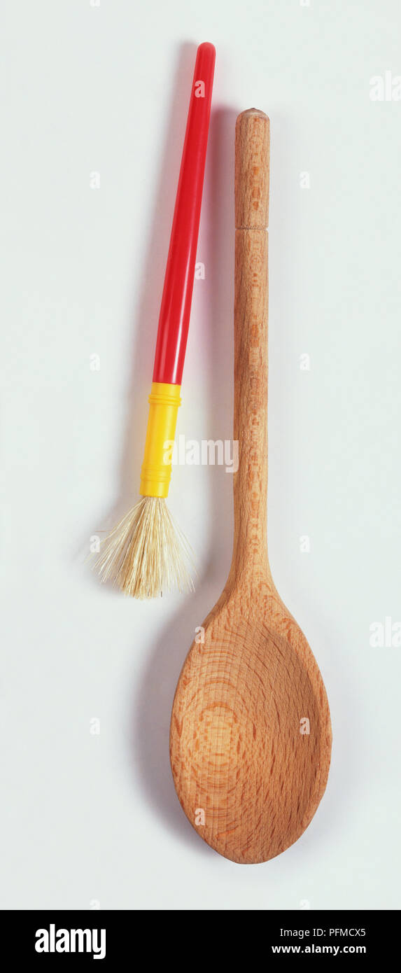 Wooden spoon and small brush Stock Photo Alamy