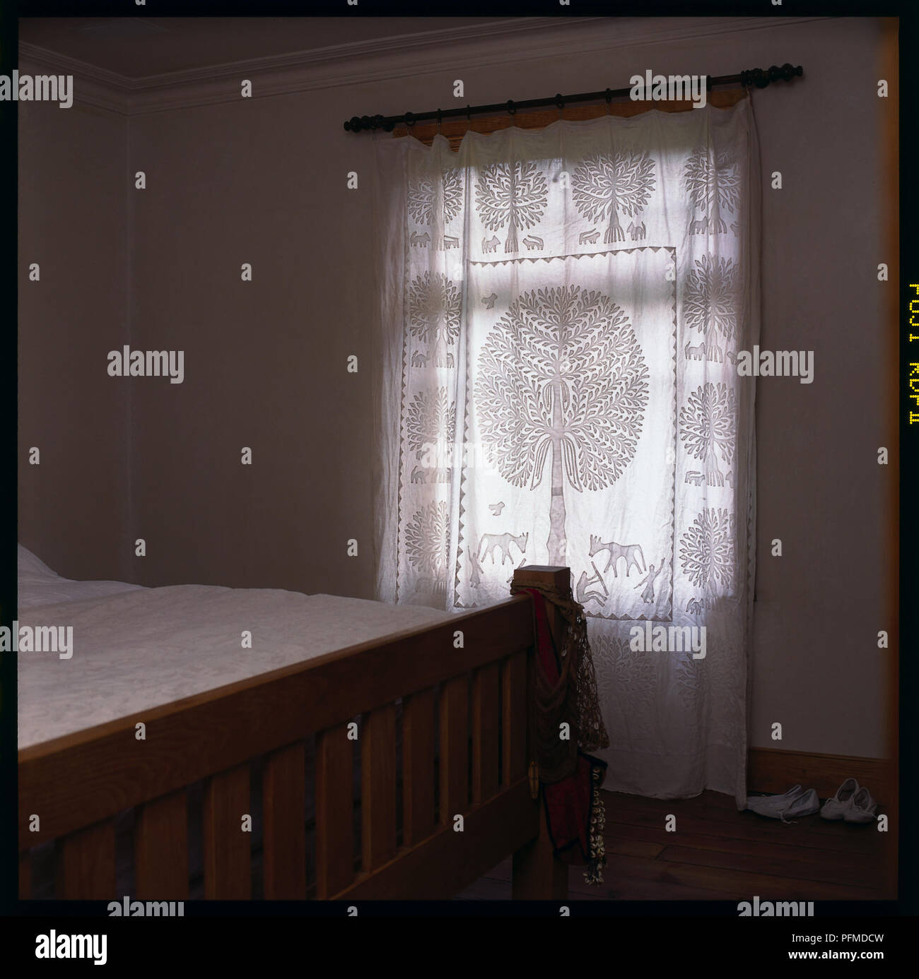 Bedroom Window With Daylight Shining Through Net Curtains Dark Room Wooden Bed Corner In Foreground Stock Photo Alamy