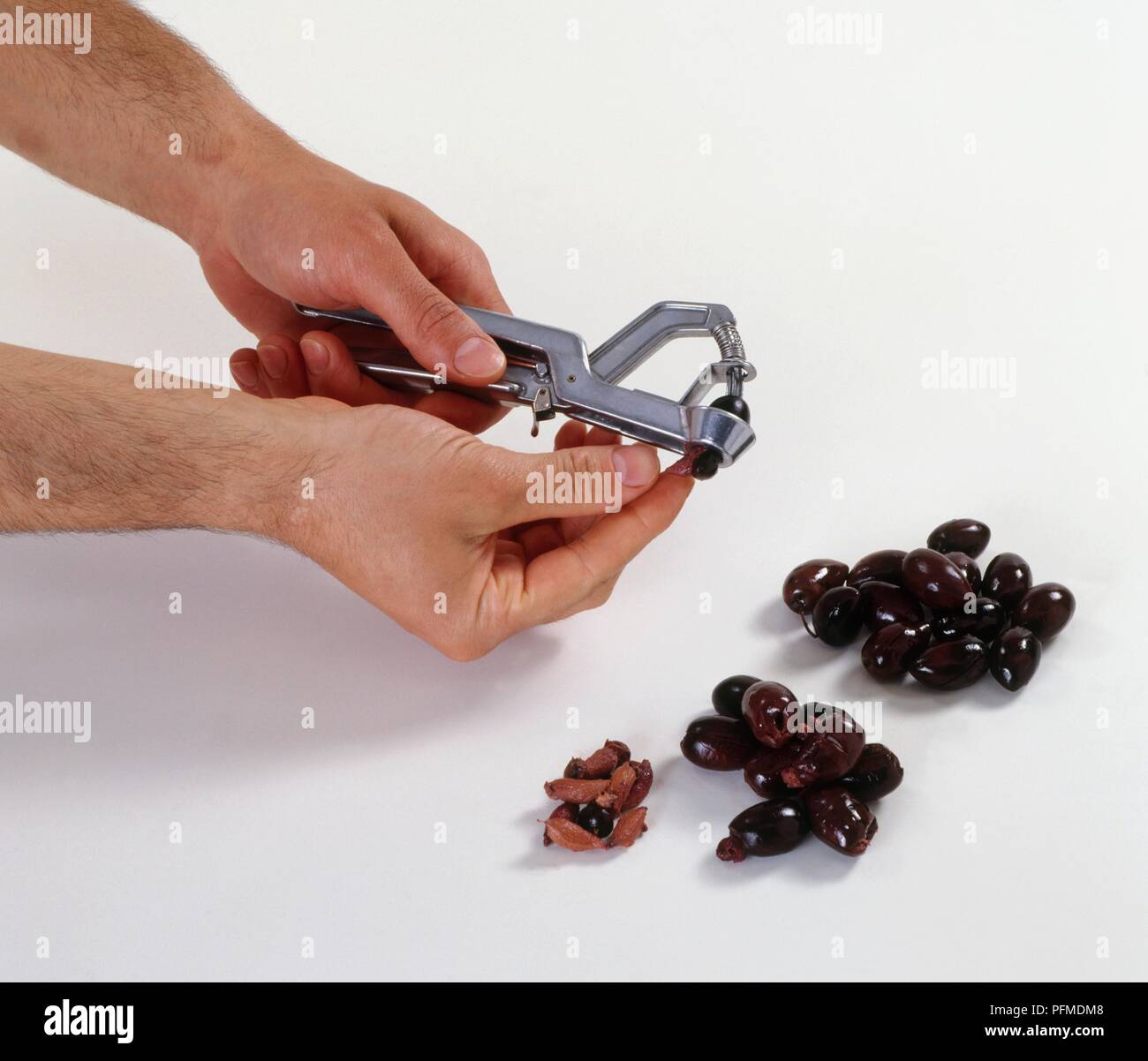 Pitting olives hires stock photography and images Alamy