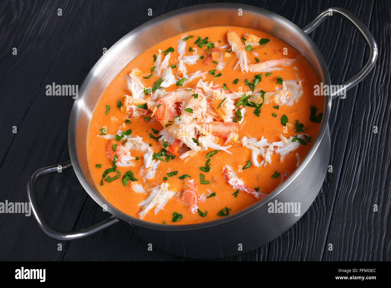 closeup of savory delicious hot bisque or thick soup of shredded snow