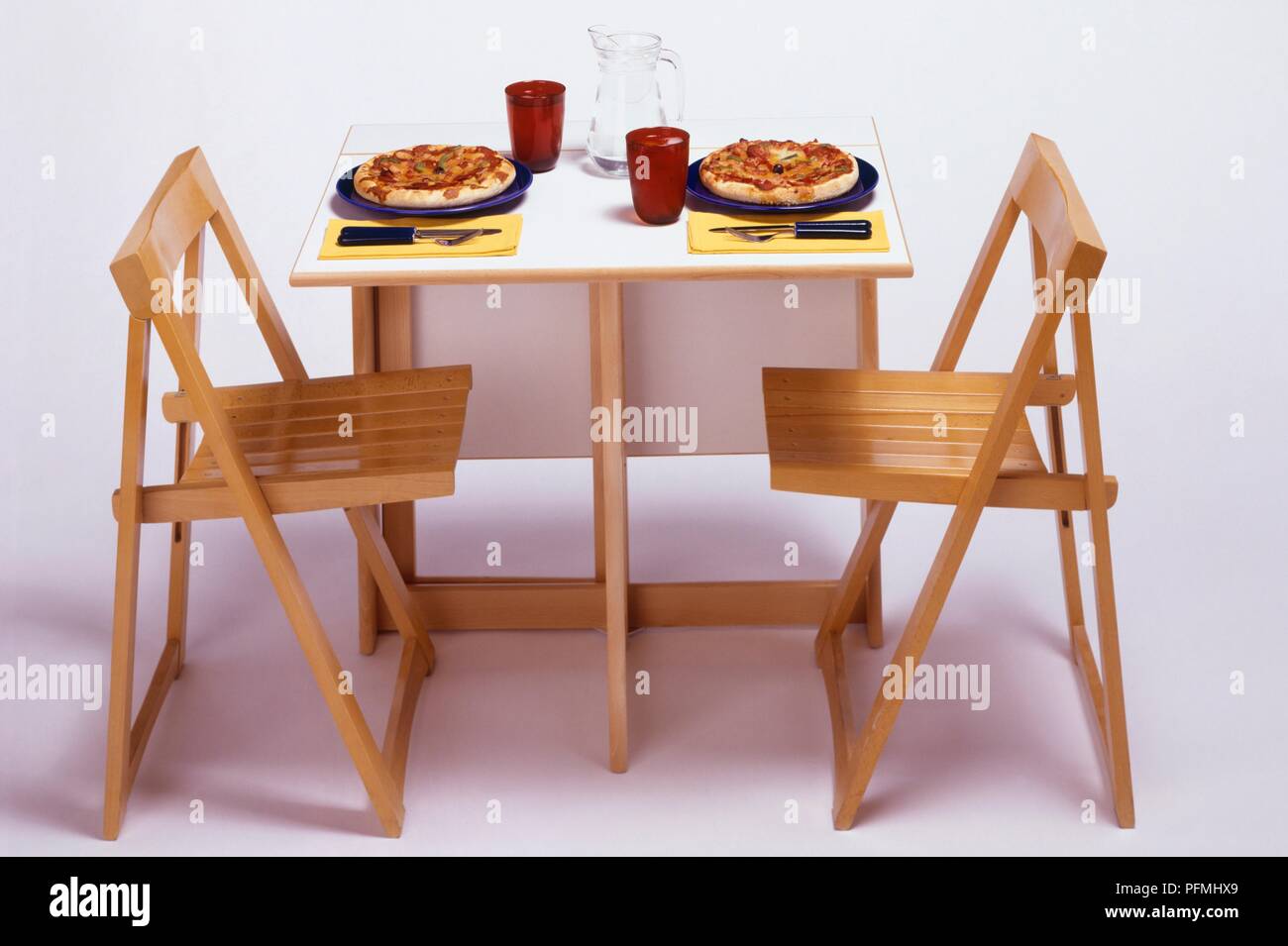 Small Fold Up Table And Chairs Set For Dinner With Pizzas