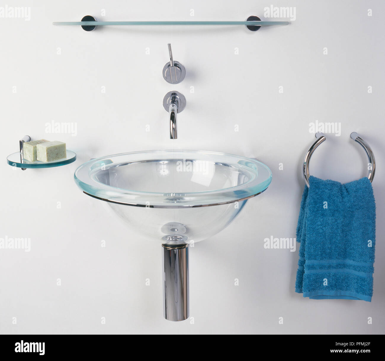 Glass basin sink in bathroom, with wall-mounted tap, soap dish, shelf, and towel  holder Stock Photo - Alamy