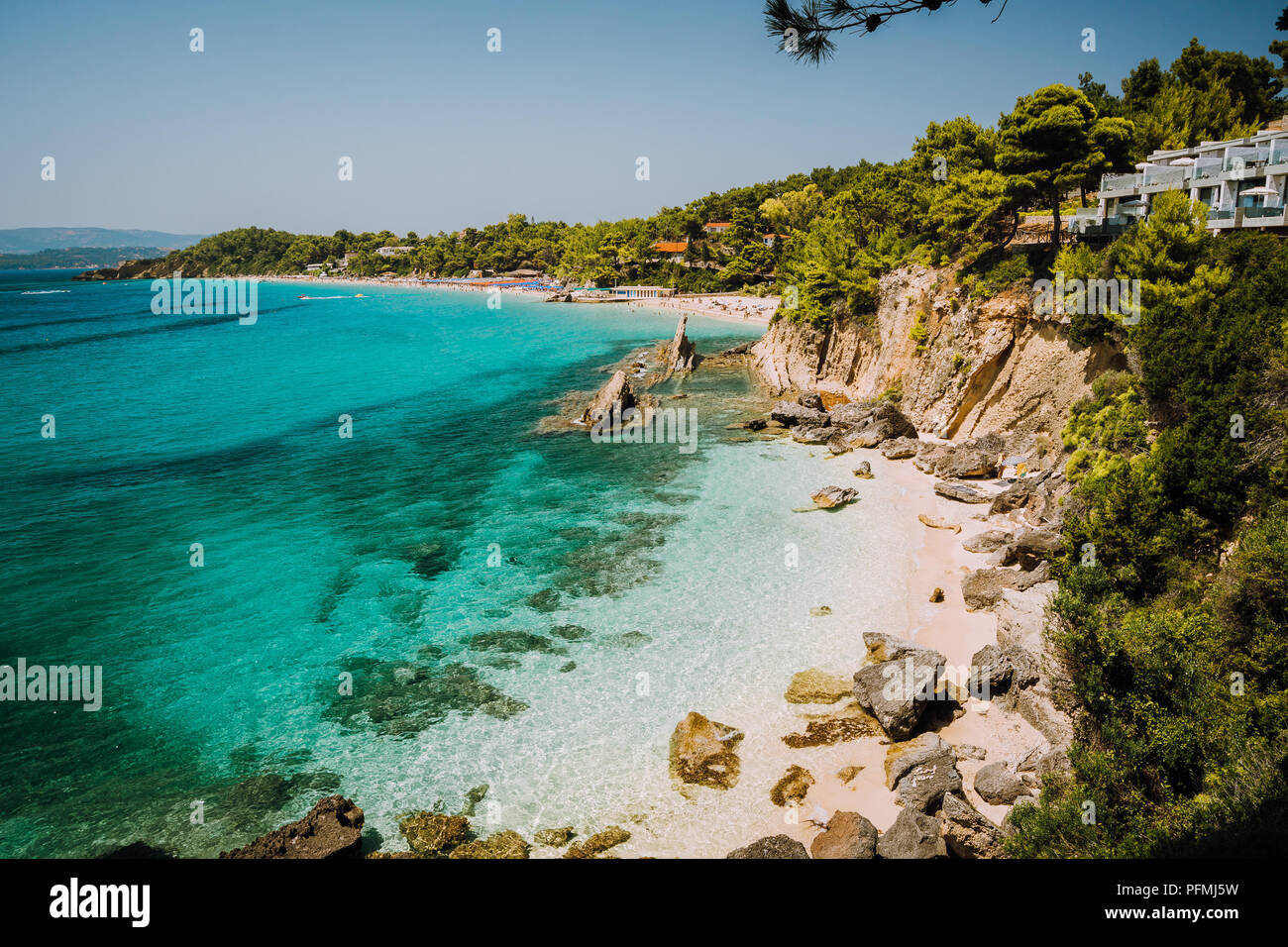 Bizarre rugged white rock cliffs near famous beach of Platys and Makrys gialos with pure clear turquoise sea water. Argostoli, Kefalonia island, Ionian, Greece Stock Photo