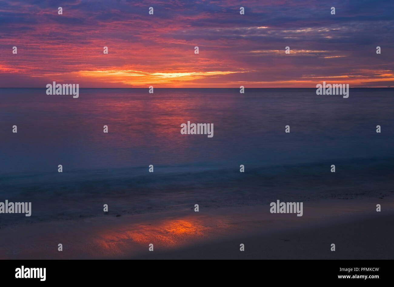 Dramatic sunrise on the beach, Pulau Weh island, Aceh province, Sumatra, Indonesia Stock Photo