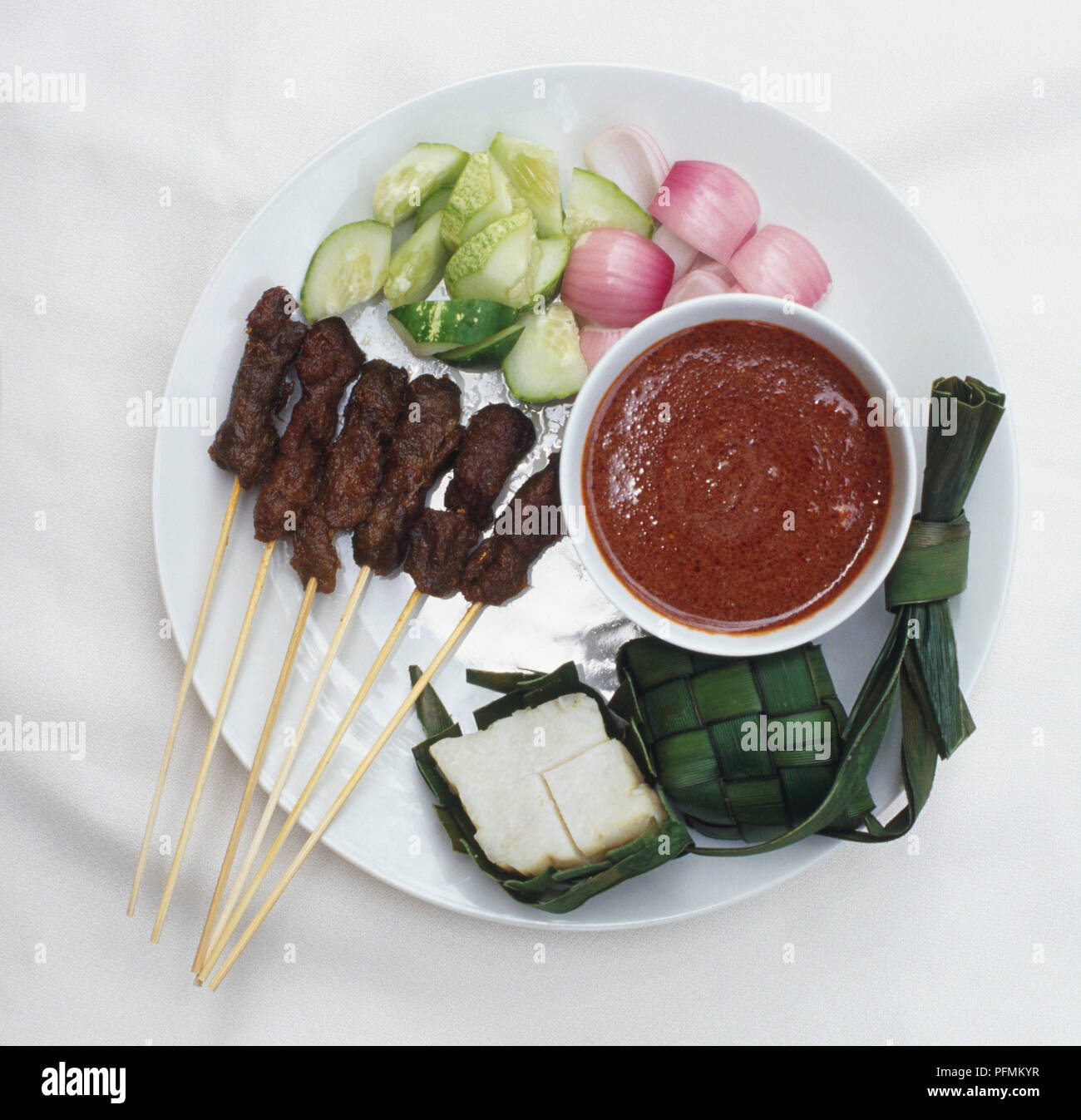 Malay cuisine, Satay, Malay version of mutton kebab served with sliced