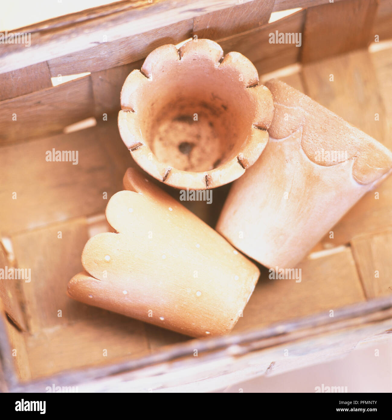 Three handmade pots in a box, view from above Stock Photo Alamy