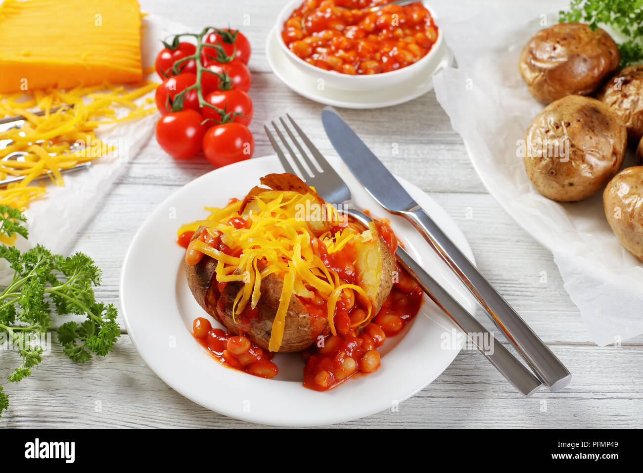 crispy skin Baked Jacket Potato With Baked navy beans in sauce And