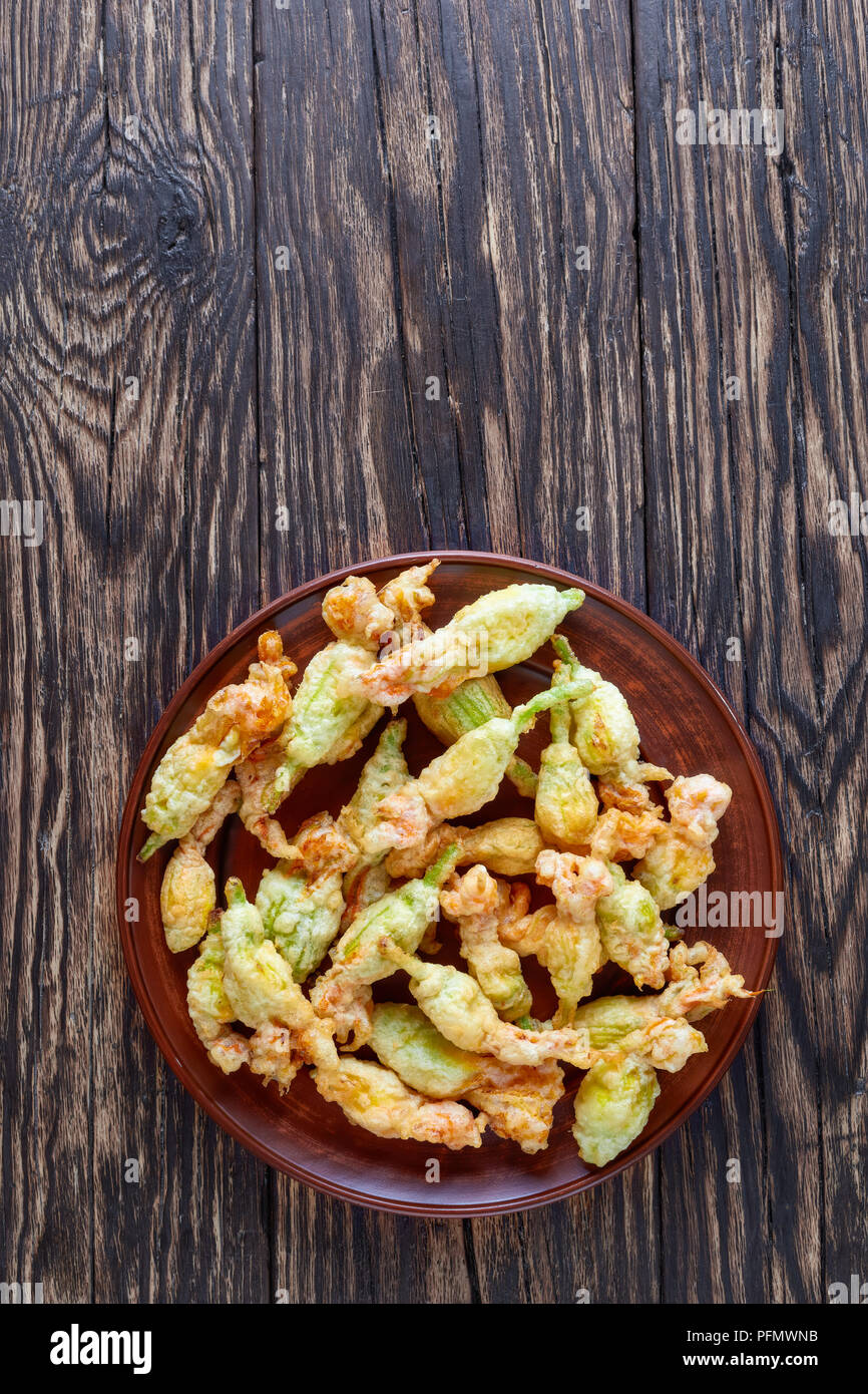 zucchini flowers was stuffed with ricotta, parmesan, anchovies and deep