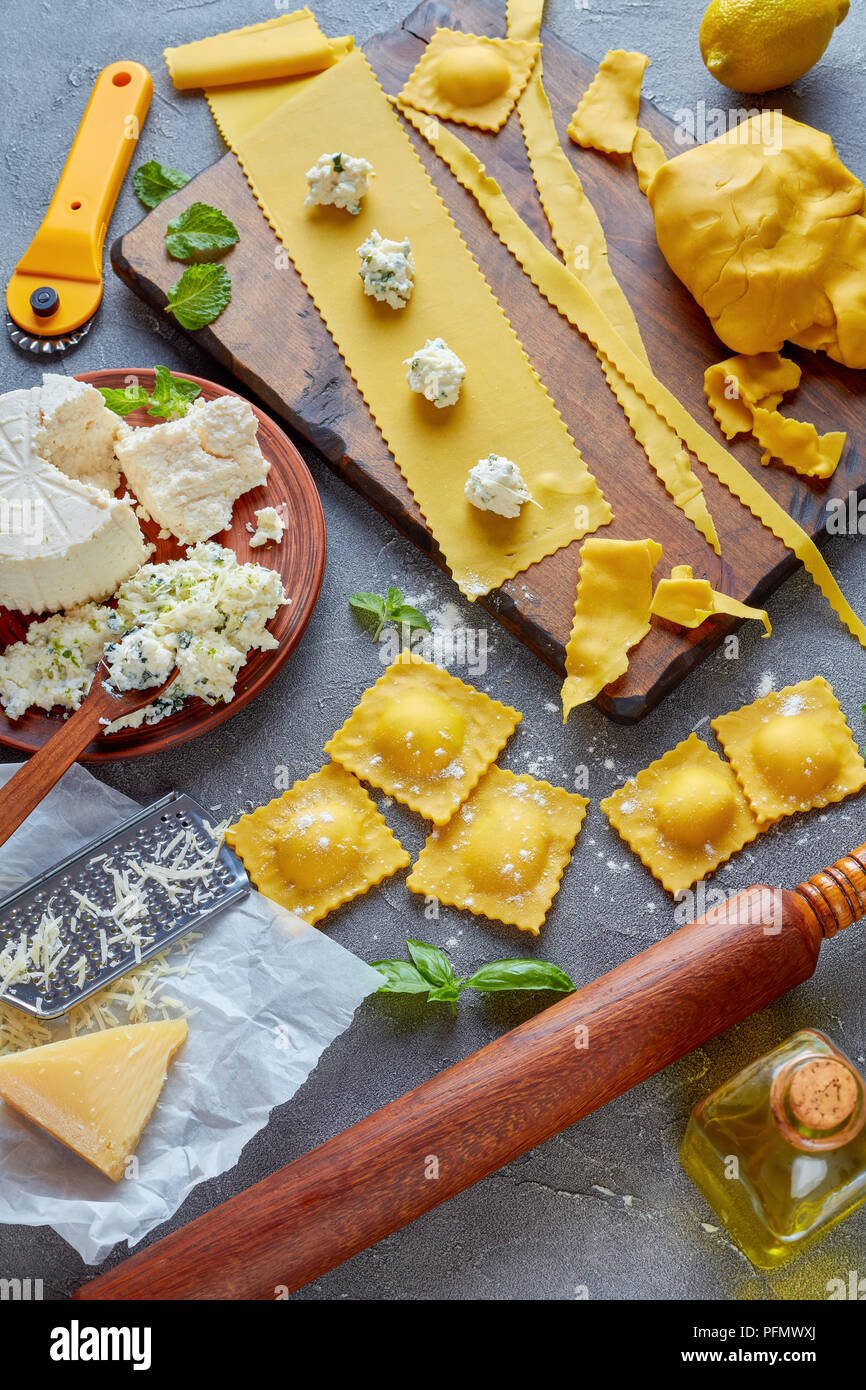 making up delicious ravioli with ricotta cheese filling mixed with