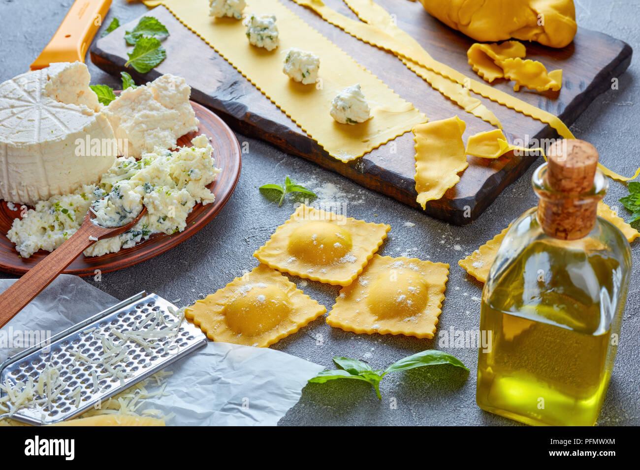 making up delicious ravioli with ricotta cheese filling mixed with
