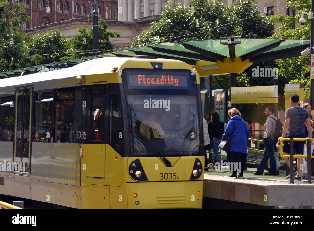 Metrolink Tram, with destination of Piccadilly Station, at St Peter's