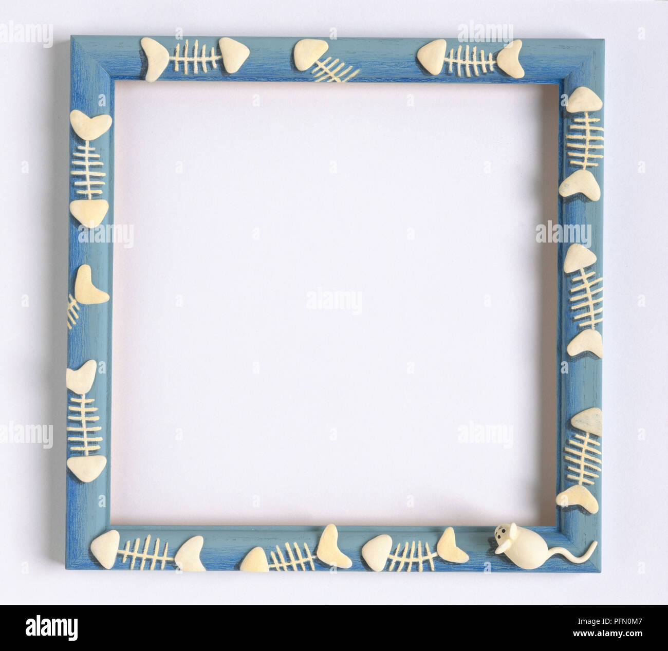Blue frame with white fish bones and a mouse Stock Photo