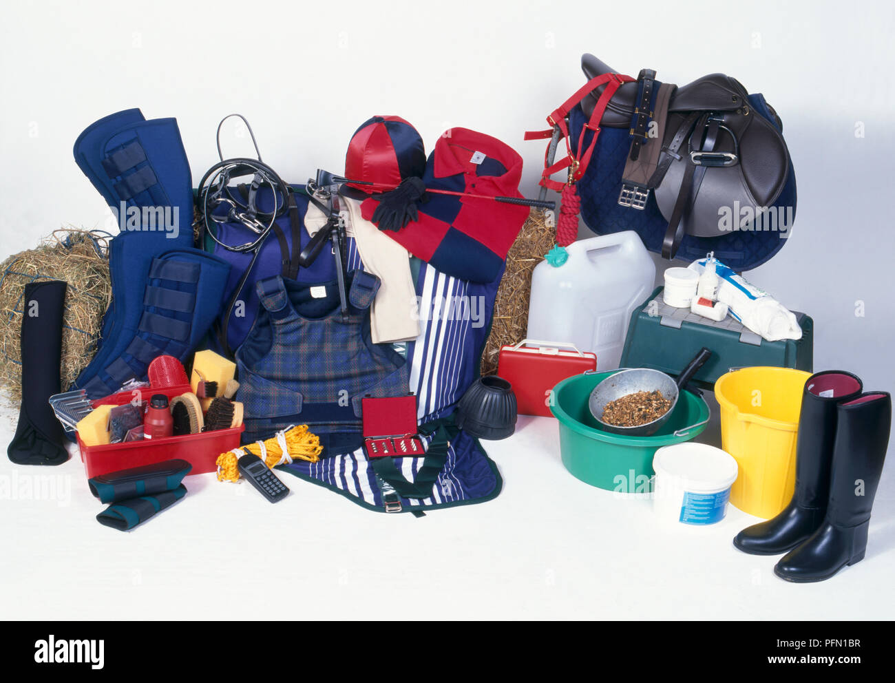 Show riding equipment, including riding boots, saddle, grooming kit ...