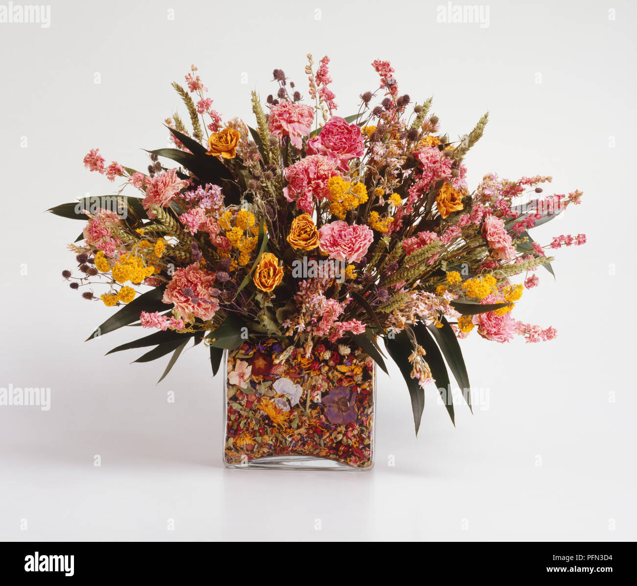 Scented Dried Flowers Contained In Rectangular Glass Vase With Pot