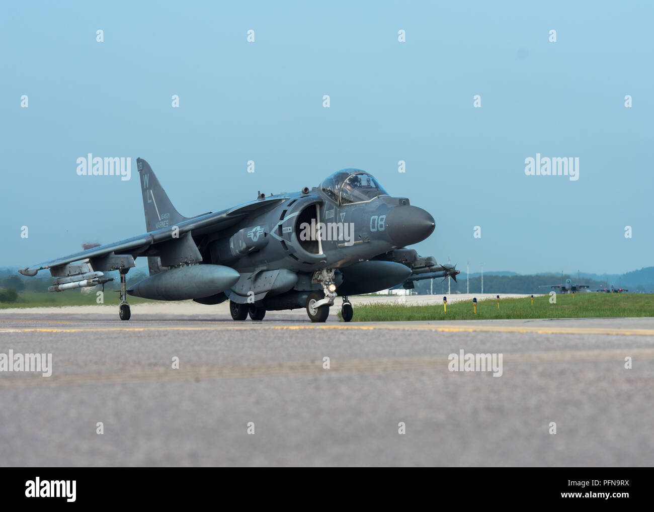 A U.S. Marine Corps AV-8B Harrier II taxis out to the runway at Volk Field Air National Guard Base, Wisconsin, during the Northern Lightning 18-2 Exercise Aug. 17, 2018. Volk field provides a year-round integrated training environment, which includes airspace, facilities, and equipment, for units to enhance their combat capabilities and readiness.(U.S. Air National Guard photo by Airman 1st Class Cameron Lewis) Stock Photo