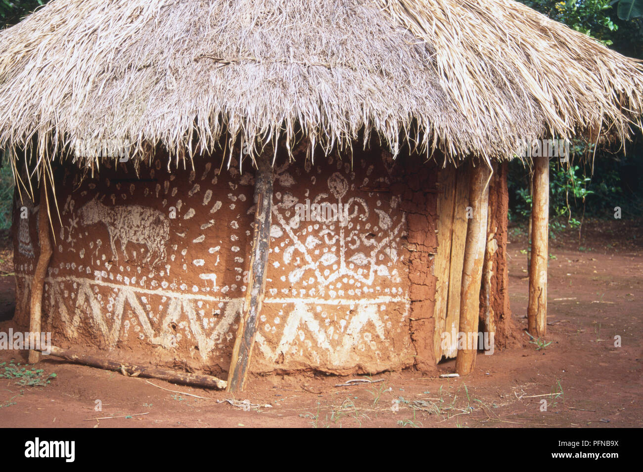 Paintings on the outside of a traditional bush church in an abandoned village, East of Dugbia, in the Democratic Republic of the Congo. October 28, 1997. Stock Photo