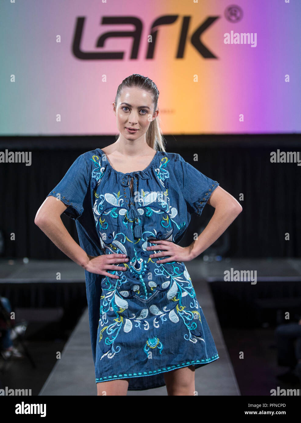 Toronto, Canada. 21st Aug, 2018. A model presents a creation during the Brand China fashion show of the 2018 Apparel Textile Sourcing Canada Trade Show at the International Center in Toronto, Canada, Aug. 21, 2018. Credit: Zou Zheng/Xinhua/Alamy Live News Stock Photo